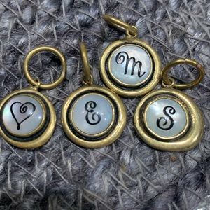 Waxing poetic mother of pearl initial heart charms